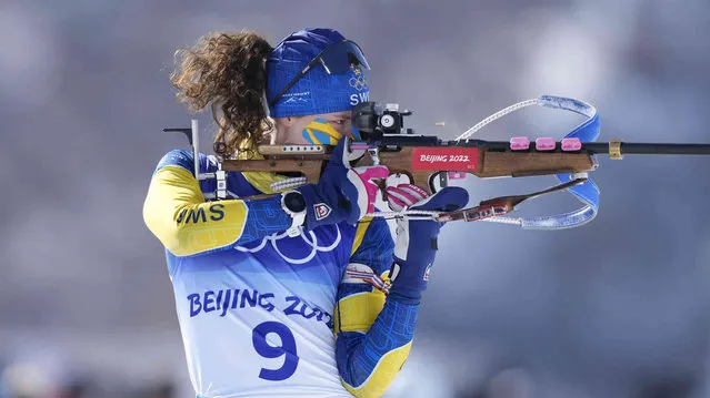 Hanna Oeberg of Sweden shoots during zeroing in the women's 12.5-kilometer mass start biathlon at the 2022 Winter Olympics, Friday, February 18, 2022, in Zhangjiakou, China. (Photo by Frank Augstein/AP Photo)