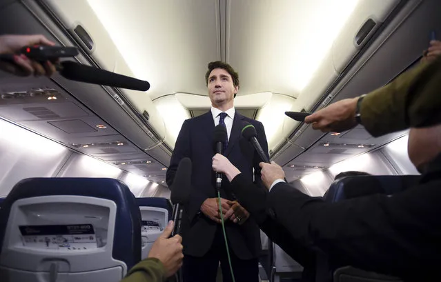 Canadian Prime Minister and Liberal Party leader Justin Trudeau makes a statement in regards to a photo coming to light of himself from 2001, wearing “brownface”, during a scrum on his campaign plane in Halifax, Nova Scotia, Wednesday, September 18, 2019. (Photo by Sean Kilpatrick/The Canadian Press via AP Photo)