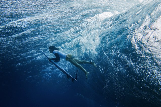 Australian surfer Molly Picklum takes part in a surfing training session in Teahupo'o, on the French Polynesian Island of Tahiti on July 21, 2024, ahead of the Paris 2024 Olympic Games. (Photo by Ben Thouard/AFP Photo)