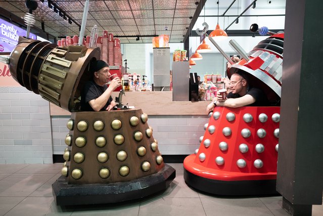 People drink coffee inside Daleks during MCM Comic Con at the ExCel London in east London on Friday, May 26, 2023. (Photo by James Manning/PA Images via Getty Images)