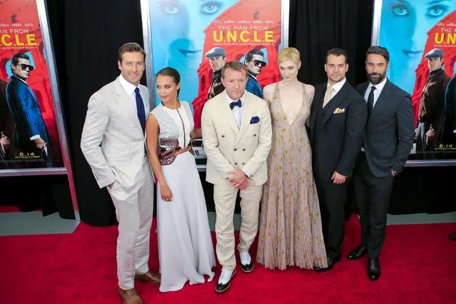 (L-R) Armie Hammer, Alicia Vikander, Guy Ritchie, Elizabeth Debicki, Henry Cavill and Luca Calvani attend the premiere of “The Man From U.N.C.L.E.” at Ziegfeld Theater in New York August 10, 2015. (Photo by Eduardo Munoz/Reuters)
