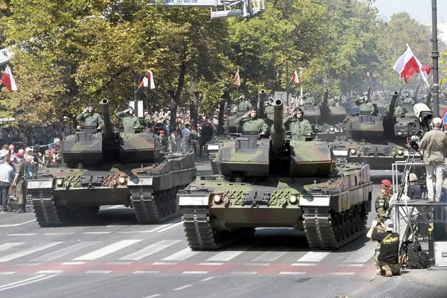 Tanks are seen at a military parade during Armed Forces Day in Warsaw, Poland August 15, 2015. (Photo by Przemyslaw Wierzchowski/Reuters/Agencja Gazeta)