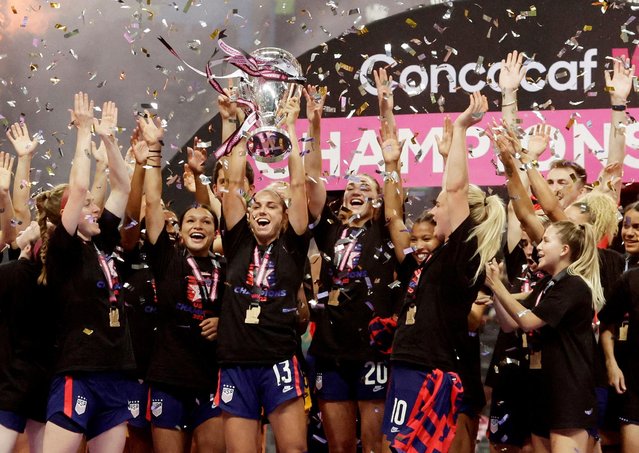 The USWNT celebrate winning the Concacaf W Championship after a Concacaf W Championship game between Canada and USWNT at Estadio BBVA on July 18, 2022 in Monterrey, Mexico. (Photo by Daniel Becerril/Reuters)
