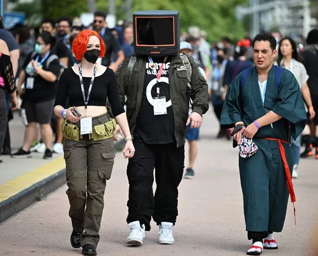 Cosplayers attend Comic-Con International on July 22, 2022 in San Diego, California. (Photo by Robyn Beck/AFP Photo)