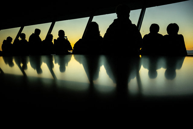 People visit Bunkyo Civic Center Observation Deck in Tokyo on December 1, 2024. (Photo by Philip Fong/AFP Photo)