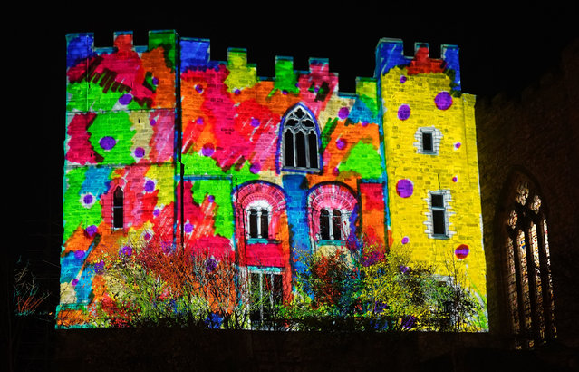 Durham Cathedral is lit up during a preview of Lumiere 2023, the UK’s light art biennial, held in Durham and Bishop Auckland, UK on Wednesday, November 15, 2023. For four nights, the medieval city will become a nocturnal art experience hosting works made with light. (Photo by Owen Humphreys/PA Images via Getty Images)