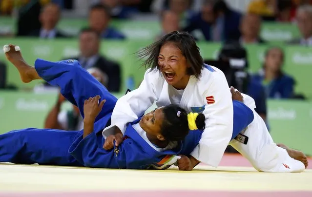 2016 Rio Olympics, Judo, Final, Women, 48 kg Bronze Medal Contests, Carioca Arena 2, Rio de Janeiro, Brazil on August 6, 2016. Otgontsetseg Galbadrakh (KAZ) of Kazakhstan and Dayaris Mestre Alvarez (CUB) of Cuba react. (Photo by Kai Pfaffenbach/Reuters)