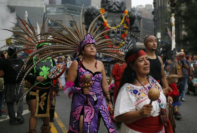 People take part in a march against climate change in New York September 21, 2014. (Photo by Eduardo Munoz/Reuters)