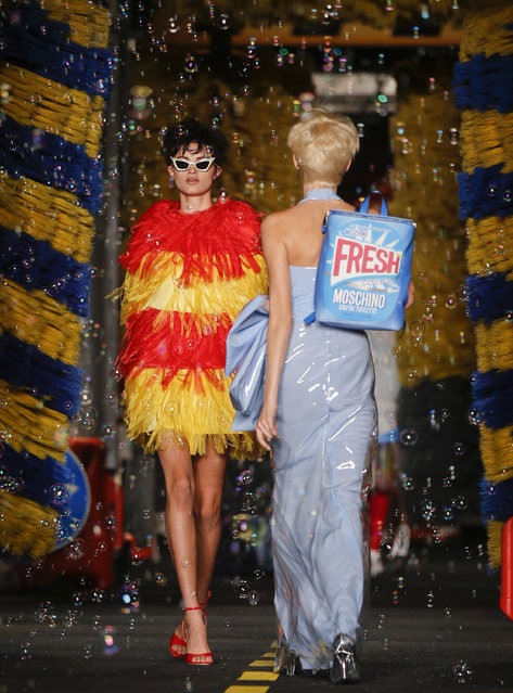Models wears creations for Moschino women's spring-summer 2016 collection, part of the Milan Fashion Week, unveiled in Milan, Italy, Thursday, September 24, 2015. (Photo by Luca Bruno/AP Photo)