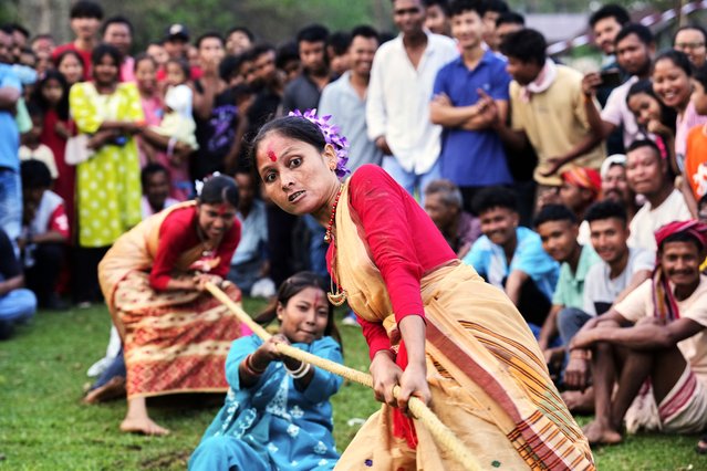 Assamese women in traditional dress take part in tug of war during the Suori festival in Boko, west of Guwahati, India, Saturday, April 19, 2025. (Photo by Anupam Nath/AP Photo)