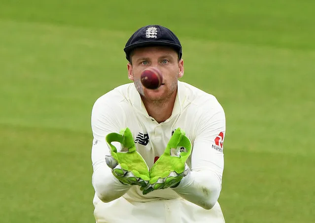 England's Jos Buttler focuses on the ball as cricket games restart without crowds following the outbreak of the coronavirus disease, at Ageas Bowl, Southampton, Britain on  August 13, 2020. (Photo by Stu Forster/Pool via Reuters)