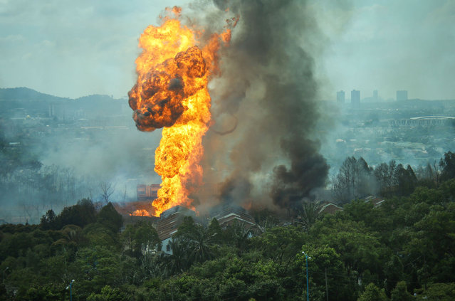 Huge blaze of fire is seen erupted high in the sky due to one of National Oil Company (Petronas) explodes in Selangor, Malaysia on 1 April, 2025. (Photo by Stringer/Anadolu via Getty Images)