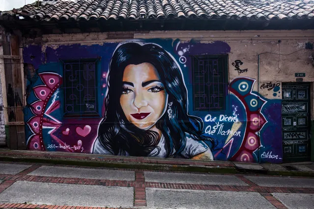 A graffiti, displays a woman, is seen at the Candelaria District in Bogota, Colombia on January 4, 2018. (Photo by Juancho Torres/Anadolu Agency/Getty Images)