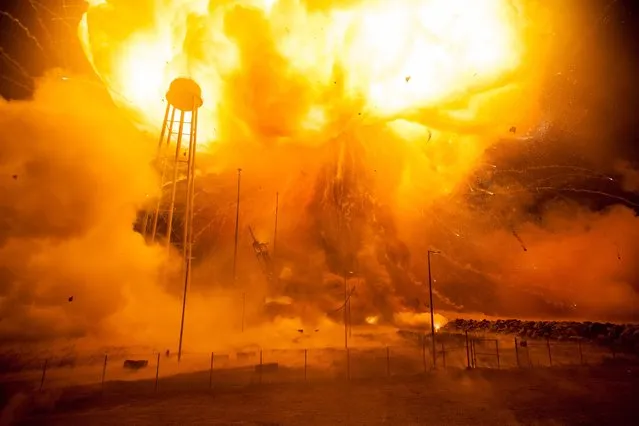 NASA's Mid-Atlantic Regional Spaceport Pad 0A is seen after the Orbital ATK Antares rocket, with Cygnus spacecraft onboard, suffered a catastrophic anomaly moments after launch in Virginia in this October 28, 2014 handout photo obtained by Reuters November 4, 2015. (Photo by Joel Kowsky/Reuters/NASA)