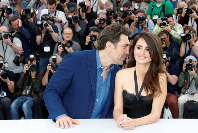 Actress Penelope Cruz smiles with actor Javier Bardem at the photocall for “Everybody Knows (Todos Lo Saben)” during the 71st annual Cannes Film Festival at Palais des Festivals on May 9, 2018 in Cannes, France. (Photo by Jean-Paul Pelissier/Reuters)