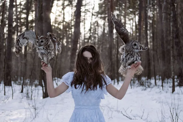 “Nastya with owls”. In true storybook style, the images were taken deep in a snow-covered forest. (Photo by Olga Barantseva/Caters News Agency)