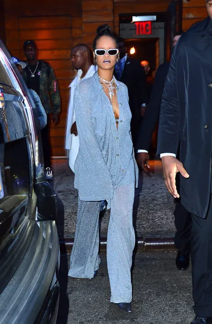 Rihanna looks striking in a silver glitter jumpsuit as she heads to her Met Gala after party at Up and Down nightclub in NYC on May 08, 2018. (Photo by Jawad Elatab/Splash News and Pictures)