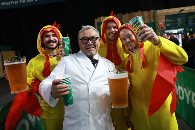 Fans dress in costume as they attend the World Darts Championships at Alexandra Palace in London London, Britain, 12 December 2025. The sporting event runs from 11 December 2025 to 03 January 2026. (Photo by Neil Hall/EPA)