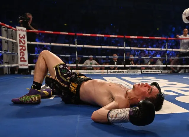 Irish professional boxer Michael Conlan is knocked down by Luis Alberto Lopez during their IBF world featherweight title fight at The SSE Arena Belfast on May 27, 2023 in Belfast, Northern Ireland. (Photo by Charles McQuillan/Getty Images)