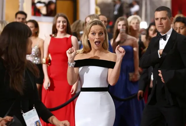 Reese Witherspoon, best actress nominee for her role in “Wild”, wears a white and black off shoulder Tom Ford gown as she arrives at the 87th Academy Awards in Hollywood, California February 22, 2015. (Photo by Lucas Jackson/Reuters)