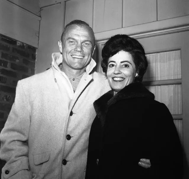 Astronaut John H. Glenn Jr. shown with his wife, Annie outside their Arlington, Va., home on February 3, 1962, during his first news conference.   Glenn spent more than five hours in the Mercury capsule atop a rocket at Cape Canaveral, Florida a week ago only to have the shot postponed. Glenn said he is anxious to get ahead with is orbit of the earth. (Photo by Bob Schutz/AP Photo)