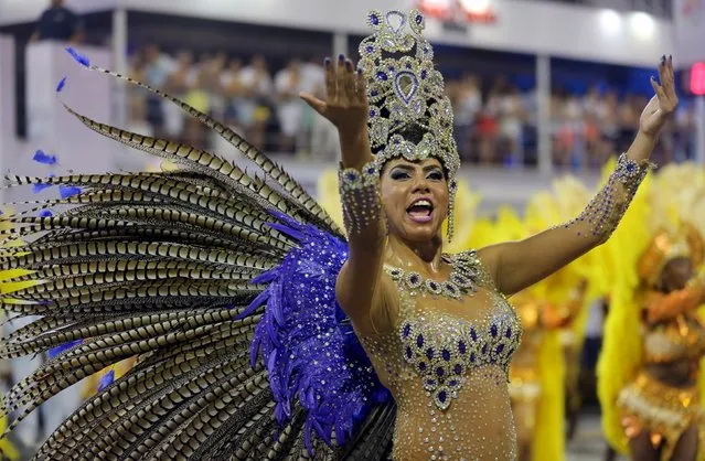 A reveller parades for Vila Maria samba school during a carnival in Sao Paulo, Brazil, February 6, 2016. (Photo by Paulo Whitaker/Reuters)