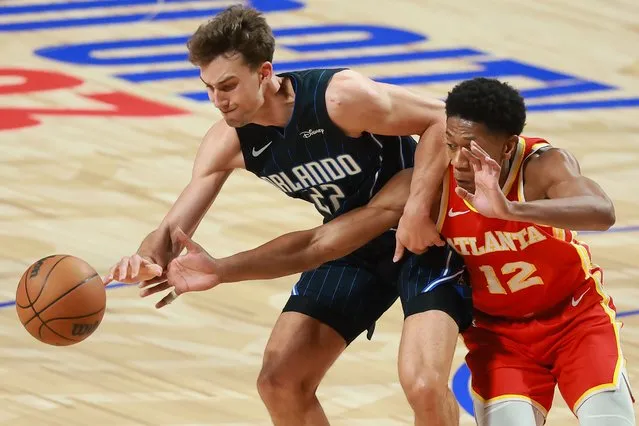 Franz Wagner #22 of the Orlando Magic dribles against De'Andre Hunter of Atlanta Hawks during the game between the Atlanta Hawks and Orlando Magic as part of 2023 NBA Mexico Games on November 9, 2023 at Arena Ciudad de Mexico in Mexico City, Mexico. (Photo by Hector Vivas/Getty Images)