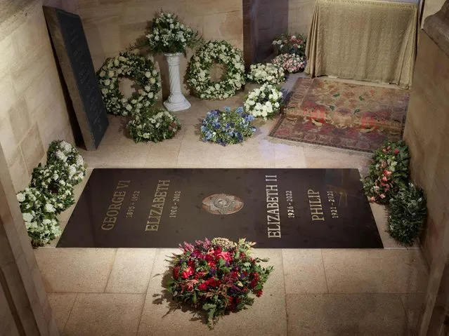 A Buckingham Palace handout image released on September 24, 2022, shows of the ledger stone at the King George VI Memorial Chapel, St George's Chapel, Windsor Castle. An inscribed stone slab marking the death of Queen Elizabeth II has been laid in the Windsor Castle chapel where her coffin was interred, Buckingham Palace said Saturday. (Photo by Royal Collection Trust/AFP Photo)