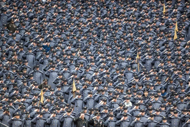 The Army Corp of Cadets salute during the National Anthem in the game between the Army Black Knights and Navy Midshipmen at Gillette Stadium on December 9, 2023 in Foxborough, Massachusetts. (Photo by Edward Diller/Getty Images)