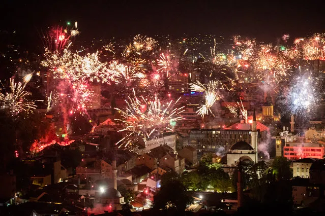 Fireworks light the night sky during FC Zeljeznicar's celebration of its 100th birthday in Sarajevo, Bosnia and Herzegovina on September 19, 2021. (Photo by Elman Omic/Anadolu Agency via Getty Images)