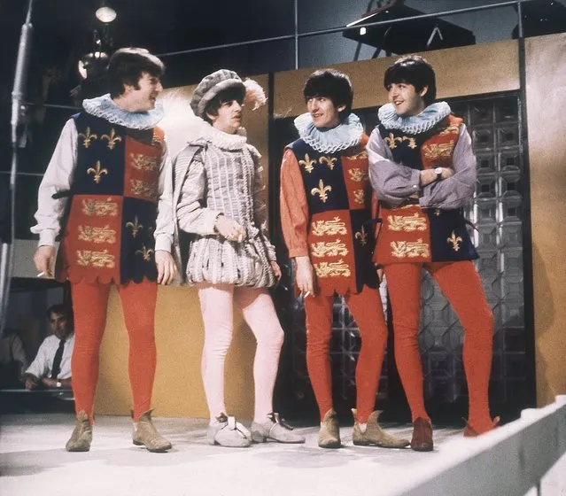 The Beatles rehearse for their forthcoming television show at Wembley Studios, London, April 1964. Ringo Starr is costumed as Sir Francis Drake, with his bandmates as Heralds.  From left, John Lennon, Ringo, George Harrison, Paul McCartney. (Photo by AP Photo)