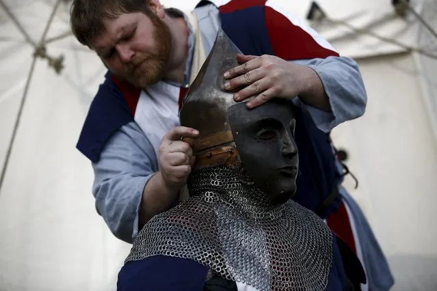 Members of U.S. team prepare for a fight during the Medieval Combat World Championship at Malbork Castle, northern Poland, April 30, 2015. (Photo by Kacper Pempel/Reuters)