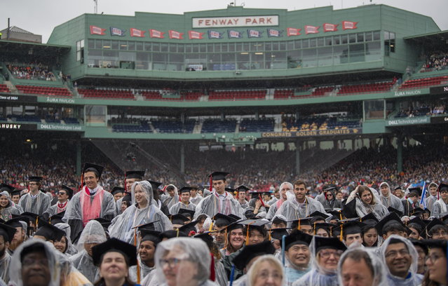 Graduates stand during the conferring of degrees as part of commencement ceremonies for Northeastern University at Fenway Park in Boston, Massachusetts, USA, 05 May 2024. (Photo by Amanda Sabga/EPA)