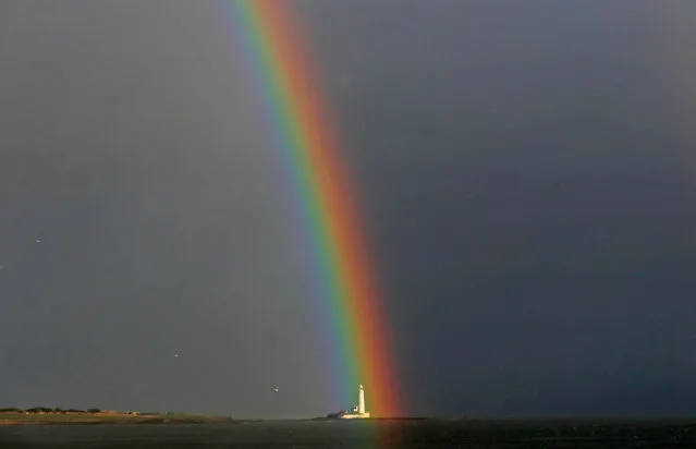 A rainbow over St Mary’s lighthouse in Whitley Bay, UK on January 29, 2016. (Photo by Owen Humphreys/PA Wire)