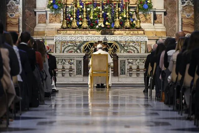 Pope Francis prays in the Gregorian Chapel in St. Peter's Basilica at the Vatican, Saturday, May 1, 2021. Pope Francis led a special prayer service Saturday evening to invoke the end of the pandemic. (Photo by Riccardo Antimiani/Pool photo via AP Photo)