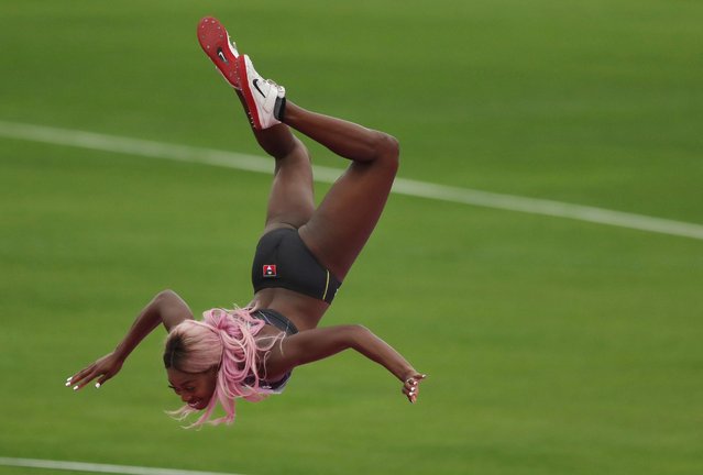 Priscilla Frederick of Antigua and Barbuda celebrates winning the silver medal in the women's high jump during the athletics at the Pan American Games in Lima, Peru, Thursday, August 8, 2019. (Photo by Ivan Alvarado/Reuters)