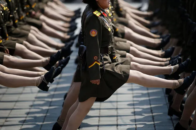 North Korean soldiers march during a military parade marking the 105th birth anniversary of the country's founding father Kim Il Sung in Pyongyang, North Korea, April 15, 2017. (Photo by Damir Sagolj/Reuters)