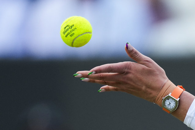 Donna Vekic of Croatia serves to Paula Badosa of Spain during their fourth round match at the Wimbledon tennis championships in London, Sunday, July 7, 2024. (Photo by Mosa'ab Elshamy/AP Photo)