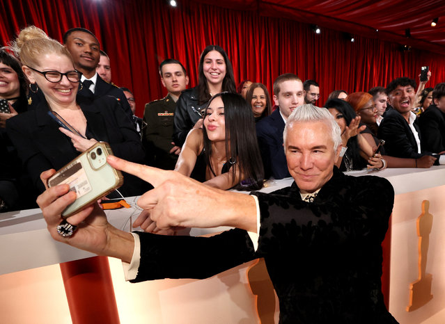 Australian film director Baz Luhrmann poses on the champagne-colored red carpet during the Oscars arrivals at the 95th Academy Awards in Hollywood, Los Angeles, California, U.S., March 12, 2023. (Photo by Mario Anzuoni/Reuters)