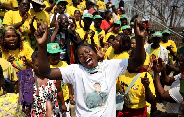 A mourner gestures at Rufaro stadium, in Mbare township where the body of Zimbabwe's founder Robert Mugabe will lie in state, Harare, Zimbabwe, September 12, 2019. (Photo by Siphiwe Sibeko/Reuters)
