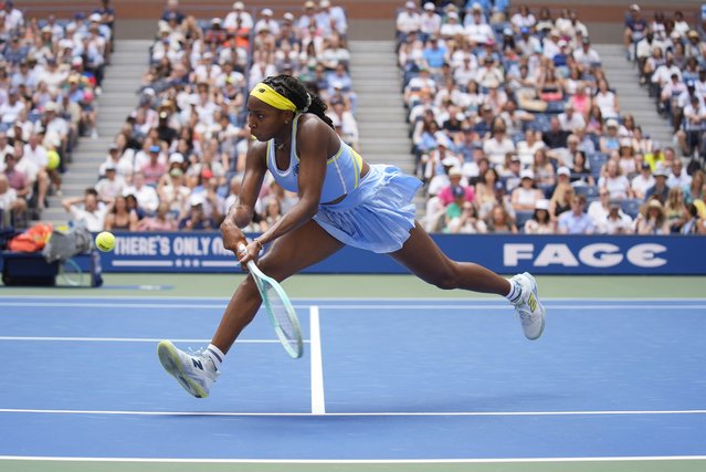Coco Gauff, of the United States, returns a shot at the net to Varvara Gracheva, of France, during the first round of the U.S. Open tennis championships, Monday, August 26, 2024, in New York. (Photo by Seth Wenig/AP Photo)
