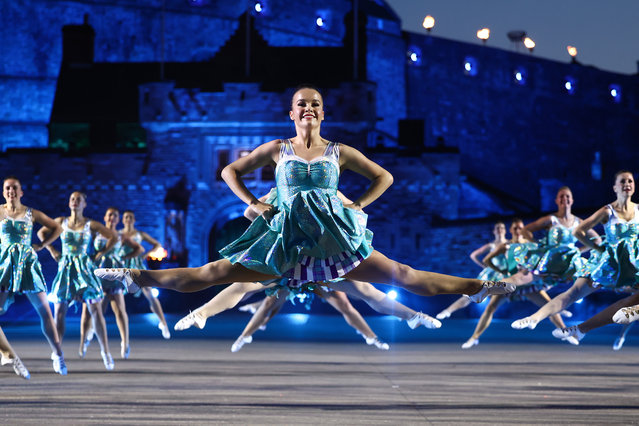 The Royal Edinburgh Military Tattoo Dancers during the working rehearsal for the first full run-through of The Royal Edinburgh Military Tattoo on August 01, 2024 in Edinburgh, Scotland. Dating back to 1949, the annual Royal Edinburgh Military Tattoo is a world-renowned military performance of music, dance, military precision, and technology, all set against the backdrop of Edinburgh Castle. This year's theme “Journeys” will transport audiences on an international cultural journey, bringing together the voices and stories that connect the cast, audience and cultures of the Tattoo. (Photo by Jeff J Mitchell/Getty Images)