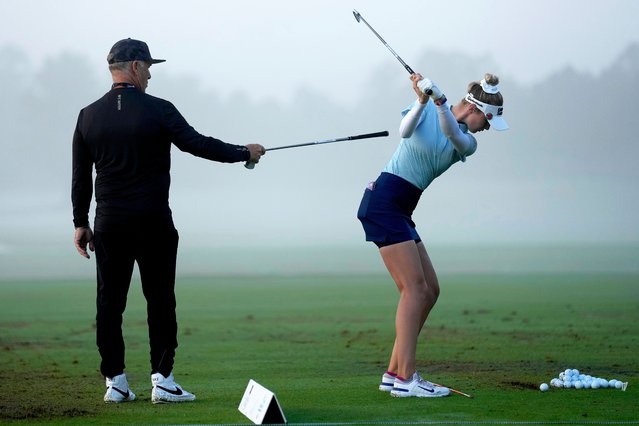 Instructor Jamie Mulligan works with Nelly Korda on the driving range prior to the second round of the Chevron Championship LPGA golf tournament Friday, April 19, 2024, at The Club at Carlton Woods, in The Woodlands, Texas. (Photo by David J. Phillip/AP Photo)