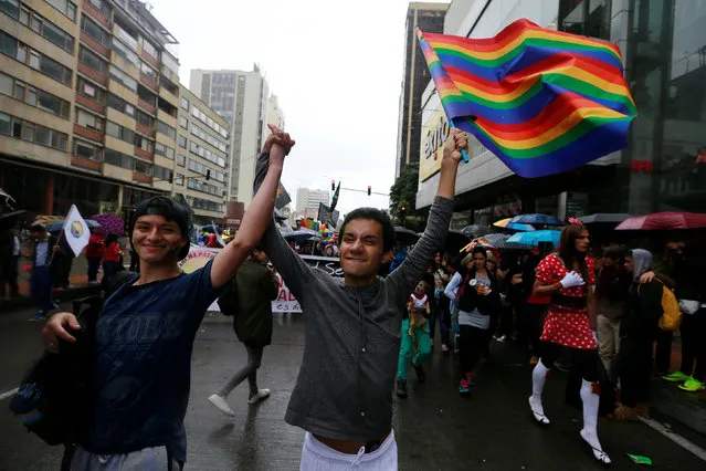 A gay couple attends an annual gay pride parade in Bogota, Colombia, July 3, 2016. (Photo by John Vizcaino/Reuters)