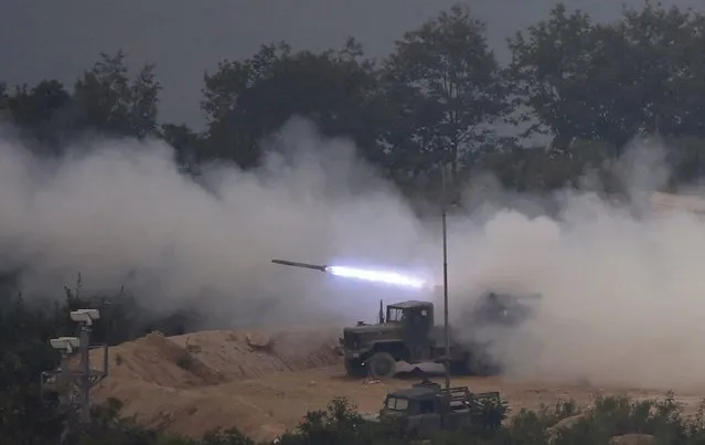 A South Korean K136 Multiple Rocket Launcher is fired during a South Korea military live-firing exercise against a possible attack from North Korea, at the Seungjin fire training field on Phocheon-gun, 80 kilometers north of Seoul, in Gyeonggi province, South Korea, 06 September 2016. (Photo by Jeon Heon-Kyun/EPA)