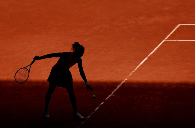Qinwen Zheng of People's Republic of China serves against Anastasia Potapova in the Women's Singles Second Round match during Day Four of the Mutua Madrid Open at La Caja Magica on April 25, 2025 in Madrid, Spain. (Photo by Clive Brunskill/Getty Images)