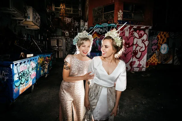 Teegan Daly, left, and Mahatia Minniecon at their midnight wedding hosted by the Altar Electric at the Ferdydurke in Melbourne, Australia on January 7, 2018. (Photo by Christian Marc Photography)