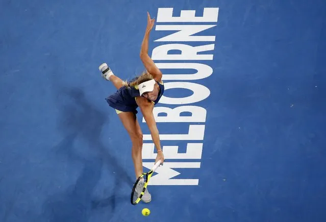 Denmark' s Caroline Wozniacki hits a return against Spain' s Carla Suarez Navarro during their women' s singles quarter- finals match on day nine of the Australian Open tennis tournament in Melbourne early January 24, 2018. (Photo by Toru Hanai/Reuters)