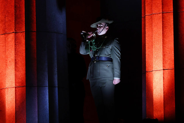 A member of the ADF plays the last post at the Shrine of Remembrance in Melbourne, Australia on April 25, 2024. Anzac Day is a national holiday in Australia, traditionally marked by a dawn service held during the time of the original Gallipoli landing and commemorated with ceremonies and parades throughout the day. Anzac Day commemorates the day the Australian and New Zealand Army Corp (ANZAC) landed on the shores of Gallipoli on April 25, 1915, during World War 1. (Photo by  Con Chronis/AAP)