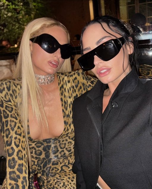 American media personality and businesswoman Paris Hilton (left) and American singer Demi Lovato on October 7, 2025 bring their combined star power to the streets of Paris in a très chic reunion. (Photo by ddlovato/Instagram)